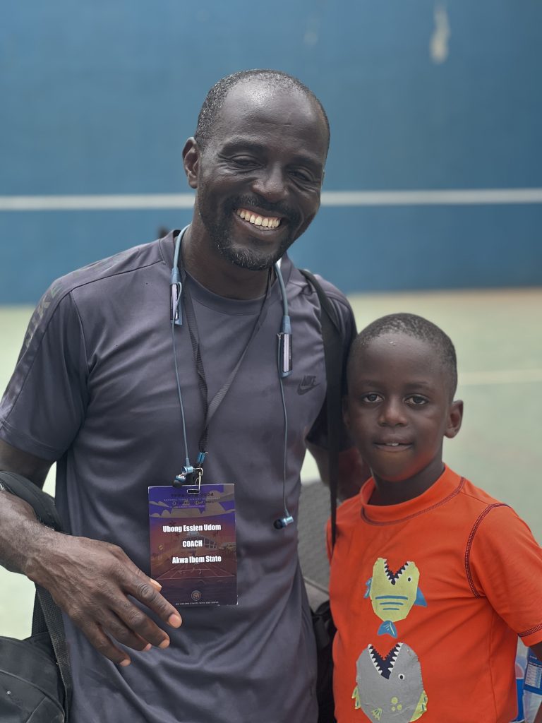 8-year-old Josiah Essien and his dad, after his first match at the ongoing TPPA-UTR National Junior Tennis Classics in Lagos